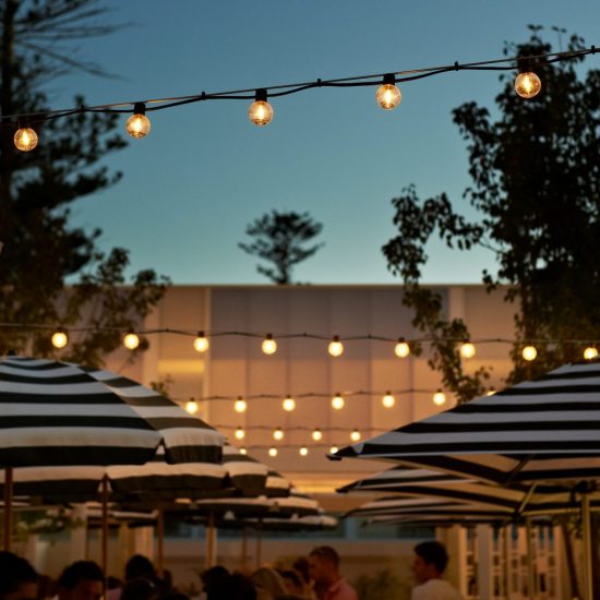 Fairy lights illuminate the outdoor Beach Club space at the Cottesloe Beach Hotel